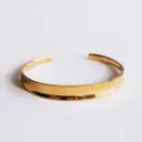 Brede uitlopende armband goudkleurig - Bazou