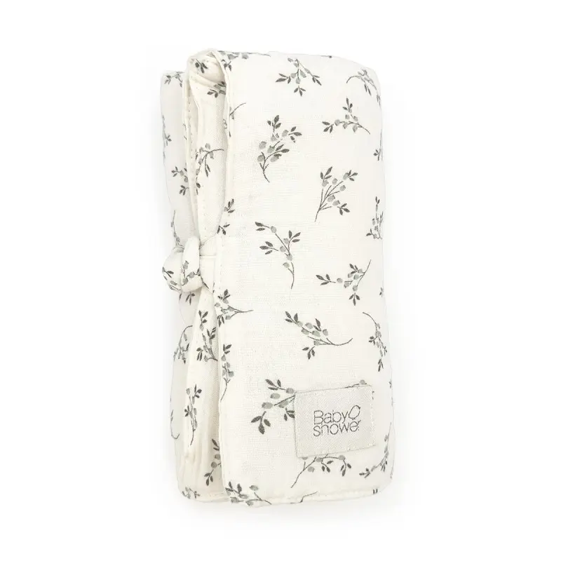Tapis de change nomade Olive Bloom - Liste de naissance Laura Mertens et Jawad Tahraoui